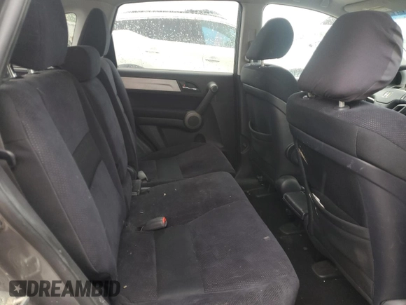 2010 Honda CR-V EX z VIN 5J6RE4H5XAL015745, wystawiony jako Copart lot #56214765 z przebiegiem 246 500 mil mil oraz Szkoda całkowita • Salvage title. Historia ofert i sprzedaży dostępna na DreamBid. Obrazek 11.