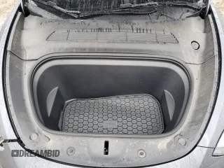 2023 Tesla Model Y Long Range z VIN 7SAYGDEE7PF870370, wystawiony jako Copart lot #55700135 z przebiegiem 32 410 mil mil oraz Szkoda całkowita • Salvage title. Historia ofert i sprzedaży dostępna na DreamBid. Obrazek 11.