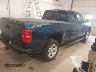 2017 Chevrolet Silverado 1500 LT with VIN 1GCVKREC1HZ136247, listed as a IAAI auction lot 42081569 with 123,906 mi miles and . Bid and sale history available at DreamBid. Image 4.