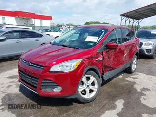 2016 Ford Escape SE z VIN 1FMCU9GX0GUB51525, wystawiony jako IAAI lot #42237629 z przebiegiem 76 616 mil mil oraz . Historia ofert i sprzedaży dostępna na DreamBid. Obrazek 2.