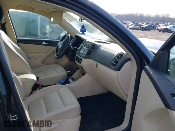 2012 Volkswagen Tiguan SE with VIN WVGAV7AX3CW531264, listed as a IAAI auction lot 41651242 with 190,669 mi miles and . Bid and sale history available at DreamBid. Image 5.