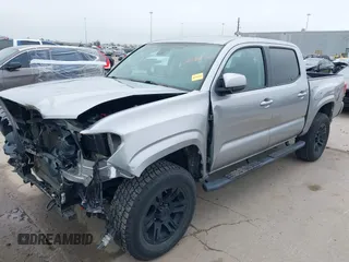 2021 Toyota Tacoma SR with VIN 3TYAX5GN0MT020061, listed as a IAAI auction lot 41592670 with 18,862 mi miles and . Bid and sale history available at DreamBid. Image 2.