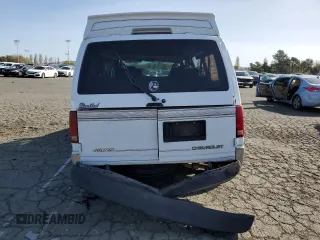 2000 Chevrolet Astro Cargo YF7 z VIN 1GBDM19W1YB211571, wystawiony jako Copart lot #52156885 z przebiegiem 211 508 mil mil oraz Nie do naprawy • Non repairable. Historia ofert i sprzedaży dostępna na DreamBid. Obrazek 6.