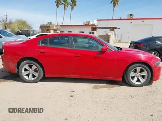 2015 Dodge Charger SE z VIN 2C3CDXBG8FH785073, wystawiony jako IAAI lot #41940067 z przebiegiem 103 979 mil mil oraz . Historia ofert i sprzedaży dostępna na DreamBid. Obrazek 12.