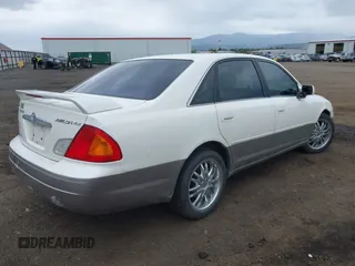 2000 Toyota Avalon XL z VIN 4T1BF28B9YU040456, wystawiony jako IAAI lot #42310333 z przebiegiem 201 596 mil mil oraz . Historia ofert i sprzedaży dostępna na DreamBid. Obrazek 4.