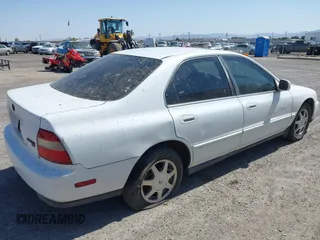 1995 Honda Accord EX z VIN 1HGCD5565SA042044, wystawiony jako IAAI lot #42433765 z przebiegiem 255 906 mil mil oraz . Historia ofert i sprzedaży dostępna na DreamBid. Obrazek 4.