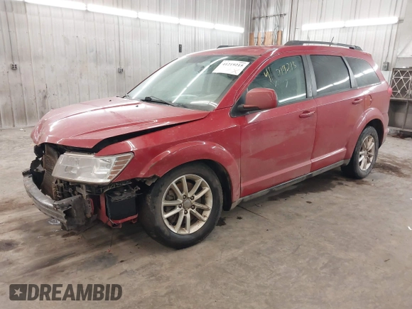 2014 Dodge Journey SXT with VIN 3C4PDCBG2ET188822, listed as a IAAI auction lot 41219215 with 174,053 mi miles. Bid and sale history available at carsss.com. Image 2.