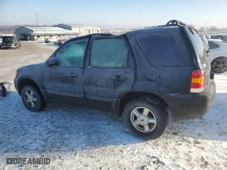 2003 Ford Escape XLS Popular with VIN 1FMYU02113KE14938, listed as a Copart auction lot 87553835 with 249,149 mi miles and Salvage Title. Bid and sale history available at carsss.com. Image 2.