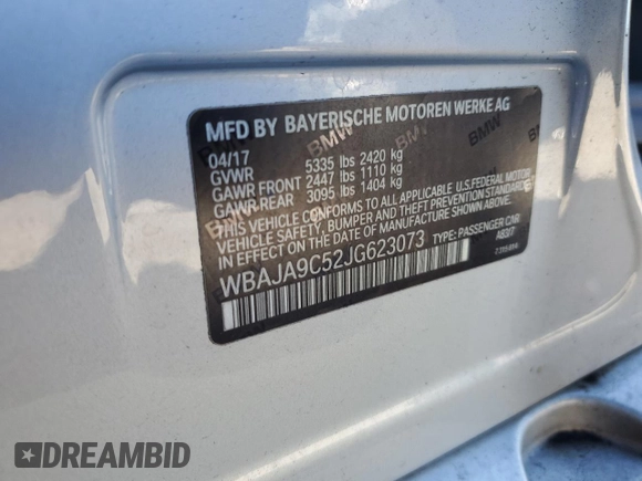 2018 BMW 5 Series 530e with VIN WBAJA9C52JG623073, listed as a Copart auction lot 82718984 with 79,543 mi miles and Clean title. Bid and sale history available at DreamBid. Image 12.