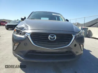 2017 Mazda CX-3 Touring z VIN JM1DKDC73H0172403, wystawiony jako Copart lot #47396355 z przebiegiem 79 865 mil mil oraz Szkoda całkowita • Salvage title. Historia ofert i sprzedaży dostępna na DreamBid. Obrazek 5.