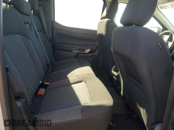 2024 Ford Ranger XLT with VIN 1FTER4HHXRLE20468, listed as a Copart auction lot 79519994 with 9,386 mi miles and Salvage title. Bid and sale history available at DreamBid. Image 10.