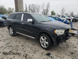 2013 Dodge Durango Citadel with VIN 1C4SDJET0DC616002, listed as a Copart auction lot 54677325 with 174,131 mi miles and Salvage title. Bid and sale history available at DreamBid. Image 4.
