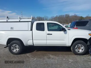 2021 Toyota Tacoma SR with VIN 3TYRX5GN6MT007673, listed as a IAAI auction lot 41691995 with 97,735 mi miles and . Bid and sale history available at DreamBid. Image 13.