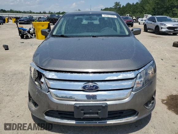2012 Ford Fusion SE z VIN 3FAHP0HA0CR328833, wystawiony jako Copart lot #57631955 z przebiegiem 94 613 mil mil oraz Szkoda całkowita • Salvage title. Historia ofert i sprzedaży dostępna na DreamBid. Obrazek 5.