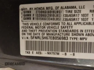 2014 Honda Odyssey EX-L with VIN 5FNRL5H67EB056983, listed as a IAAI auction lot 42318699 with 256,267 mi miles and . Bid and sale history available at DreamBid. Image 9.