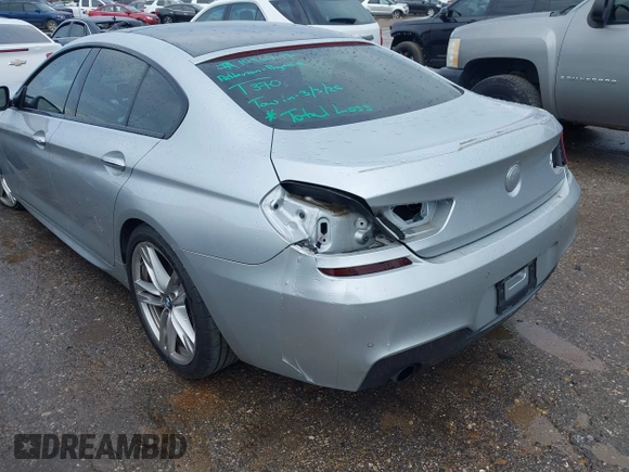 2015 BMW 6 Series 640i z VIN WBA6A0C51FD318982, wystawiony jako IAAI lot #41875547 z przebiegiem 60 968 mil mil oraz . Historia ofert i sprzedaży dostępna na DreamBid. Obrazek 17.