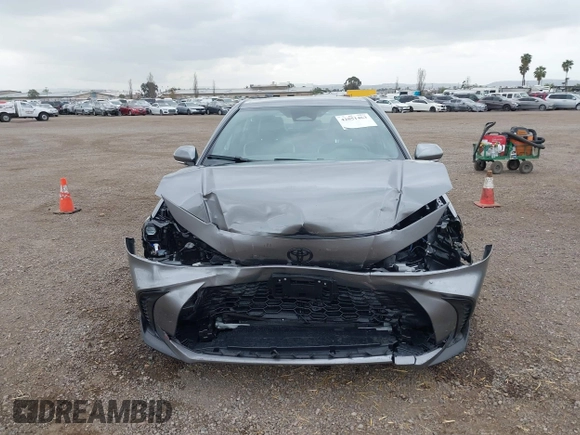 2025 Toyota Camry LE with VIN 4T1DAACK8SU571597, listed as a IAAI auction lot 42051463 with 1,681 mi miles and . Bid and sale history available at DreamBid. Image 12.