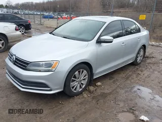 2015 Volkswagen Jetta Sedan 1.8T SE with VIN 3VWD17AJ4FM302117, listed as a IAAI auction lot 41917138 with 122,946 mi miles. Bid and sale history available at carsss.com. Image 2.