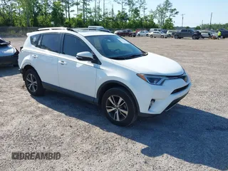 2018 Toyota RAV4 XLE z VIN 2T3WFREV6JW511792, wystawiony jako IAAI lot #42274076 z przebiegiem 95 270 mil mil oraz . Historia ofert i sprzedaży dostępna na DreamBid. Obrazek 1.