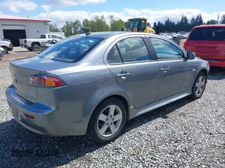 2014 Mitsubishi Lancer SE with VIN JA32V2FWXEU001902, listed as a IAAI auction lot 42116913 with 117,335 mi miles and . Bid and sale history available at carsss.com. Image 4.