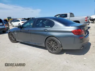 2015 BMW 5 Series 550i with VIN WBAKN9C59FD961491, listed as a Copart auction lot 60208745 with 70,241 mi miles and Salvage title. Bid and sale history available at DreamBid. Image 2.