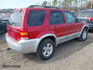 2007 Ford Escape Hybrid with VIN 1FMCU59H17KA98246, listed as a IAAI auction lot 41789024 with 999,999 mi miles. Bid and sale history available at carsss.com. Image 4.