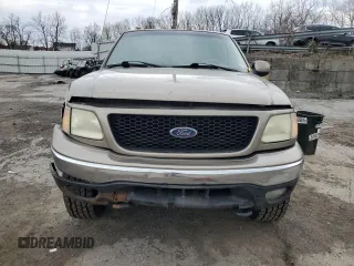 2002 Ford F-150 XL with VIN 1FTRX08L12KA41875, listed as a Copart auction lot 64756525 with 221,793 mi miles and Non repairable. Bid and sale history available at DreamBid. Image 5.