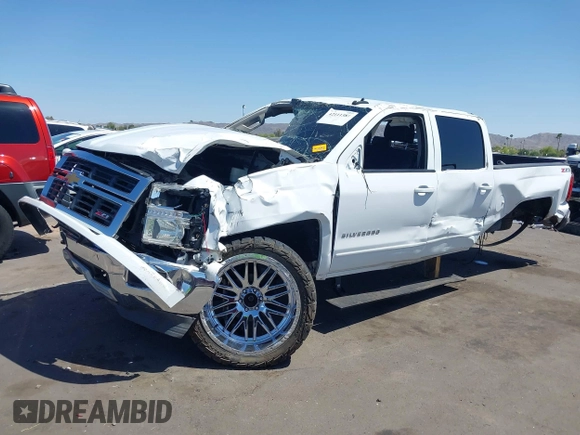 2015 Chevrolet Silverado 1500 LT with VIN 1GCUKREC5FF199331, listed as a IAAI auction lot 42111381 with 180,056 mi miles and . Bid and sale history available at DreamBid. Image 6.