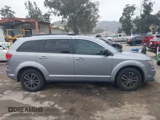 2018 Dodge Journey SE with VIN 3C4PDCAB1JT141295, listed as a IAAI auction lot 42098218 with 110,691 mi miles. Bid and sale history available at carsss.com. Image 13.