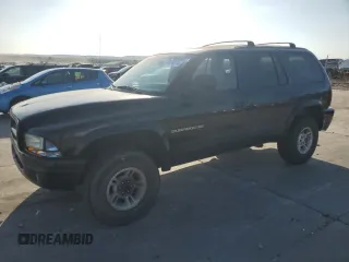 1999 Dodge Durango z VIN 1B4HS28Z4XF521562, wystawiony jako Copart lot #76974074 z przebiegiem 202 296 mil mil oraz Szkoda całkowita • Salvage title. Historia ofert i sprzedaży dostępna na DreamBid. Obrazek 1.