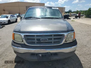 2004 Ford F-150 XL with VIN 2FTRX17W54CA32203, listed as a Copart auction lot 61666385 with Not provided miles and Salvage title. Bid and sale history available at DreamBid. Image 5.