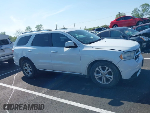 2013 Dodge Durango Crew with VIN 1C4RDJDG0DC670810, listed as a IAAI auction lot 41974024 with 209,379 mi miles and . Bid and sale history available at DreamBid. Image 13.