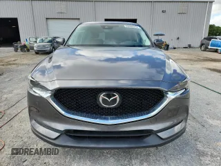 2019 Mazda CX-5 Grand Touring with VIN JM3KFADM2K1637664, listed as a Copart auction lot 63400975 with 45,663 mi miles and Salvage title. Bid and sale history available at DreamBid. Image 5.