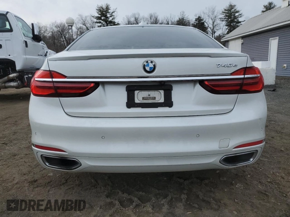 2018 BMW 7 Series 740e xDrive with VIN WBA7J2C57JG938114, listed as a Copart auction lot 41833424 with 45,559 mi miles and . Bid and sale history available at DreamBid. Image 6.