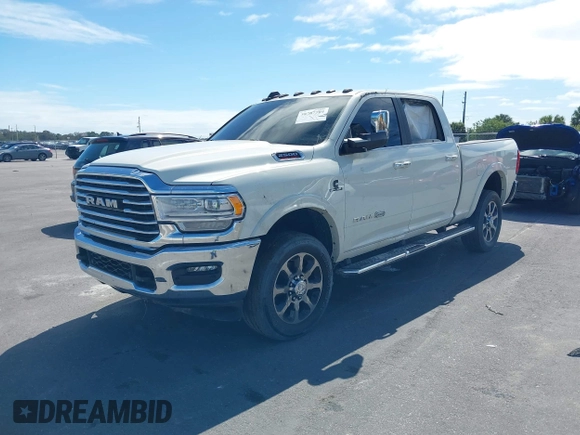 2020 Ram 2500 Longhorn with VIN 3C6UR5GL6LG230556, listed as a IAAI auction lot 38787704 with Not provided miles and . Bid and sale history available at DreamBid. Image 2.