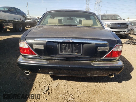 2001 Jaguar XJ with VIN SAJDA23C31LF28667, listed as a Copart auction lot 76983144 with 87,542 mi miles and Clean title. Bid and sale history available at DreamBid. Image 6.