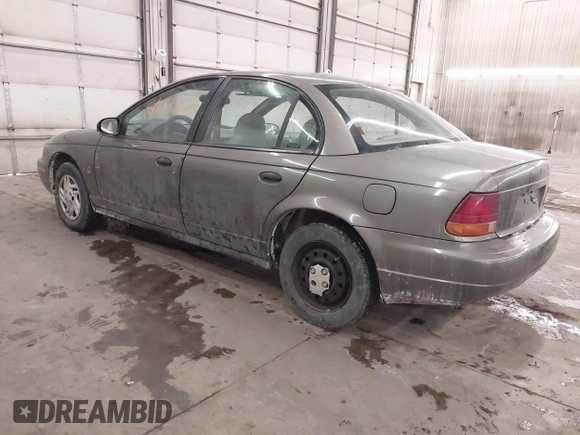 1998 Saturn SL z VIN 1G8ZH528XWZ240574, wystawiony jako IAAI lot #41588681 z przebiegiem Nie podano mil oraz . Historia ofert i sprzedaży dostępna na DreamBid. Obrazek 3.