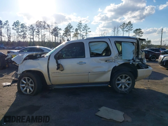 2013 GMC Yukon Denali with VIN 1GKS1EEF6DR278035, listed as a IAAI auction lot 41526763 with 149,815 mi miles. Bid and sale history available at carsss.com. Image 14.