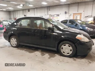 2007 Nissan Versa 1.8 SL with VIN 3N1BC11E47L411983, listed as a IAAI auction lot 41391334 with 201,830 mi miles. Bid and sale history available at carsss.com. Image 14.
