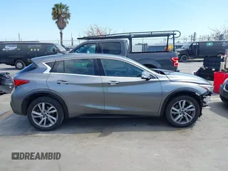 2018 Infiniti QX30 z VIN SJKCH5CP2JA004717, wystawiony jako IAAI lot #42272092 z przebiegiem 129 911 mil mil oraz . Historia ofert i sprzedaży dostępna na DreamBid. Obrazek 14.