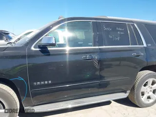 2015 Chevrolet Tahoe LTZ with VIN 1GNSCCKCXFR117525, listed as a IAAI auction lot 41839259 with 143,413 mi miles. Bid and sale history available at carsss.com. Image 15.