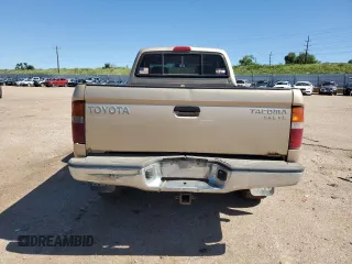 1999 Toyota Tacoma with VIN 4TAWN72N4XZ560411, listed as a Copart auction lot 61499925 with 395,215 mi miles and Salvage title. Bid and sale history available at DreamBid. Image 6.