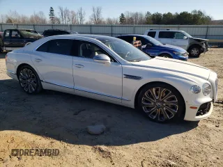 2023 Bentley Flying Spur W12 with VIN SCBBB6ZG8PC010034, listed as a Copart auction lot 46667145 with 21,437 mi miles and Salvage Title. Bid and sale history available at DreamBid. Image 4.