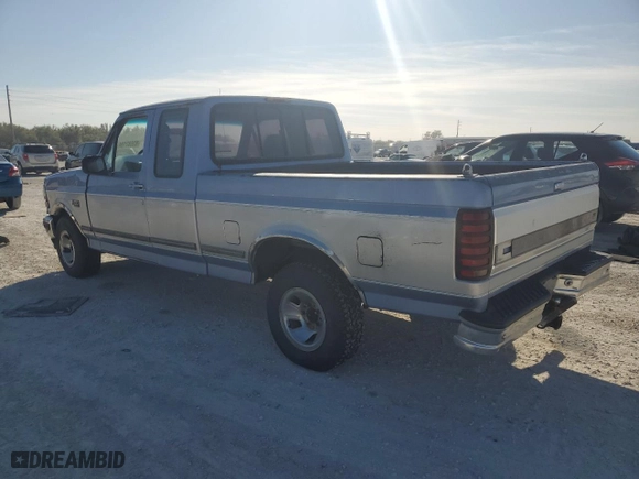 1996 Ford F-150 Special with VIN 1FTEX15N2TKA28838, listed as a Copart auction lot 83682194 with 0 miles and Salvage Title. Bid and sale history available at carsss.com. Image 2.