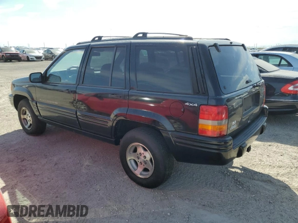 1998 Jeep Grand Cherokee Laredo with VIN 1J4GZ48Y7WC321234, listed as a Copart auction lot 75438624 with 0 mi miles and Salvage Title. Bid and sale history available at carsss.com. Image 2.