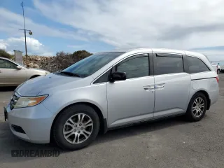 2012 Honda Odyssey EX-L with VIN 5FNRL5H62CB117251, listed as a Copart auction lot 44238135 with 74,295 mi miles and Salvage Title. Bid and sale history available at carsss.com. Image 1.