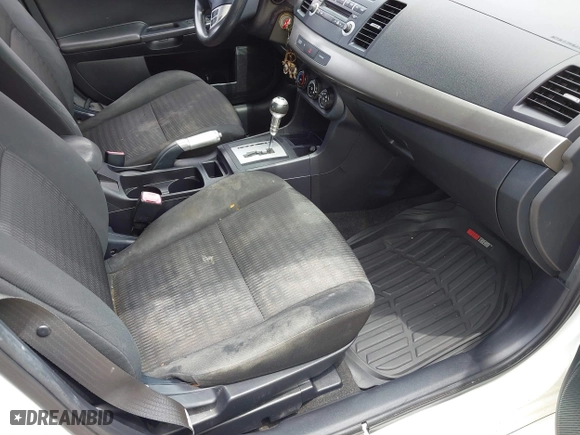 2012 Mitsubishi Lancer ES with VIN JA32U2FU5CU029556, listed as a IAAI auction lot 42104297 with 111,821 mi miles. Bid and sale history available at carsss.com. Image 5.