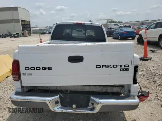 2004 Dodge Dakota SLT with VIN 1D7HL48K14S719751, listed as a Copart auction lot 64031654 with 288,226 mi miles and Salvage Title. Bid and sale history available at DreamBid. Image 6.