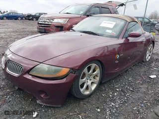 2004 BMW Z4 2.5i with VIN 4USBT33544LS50607, listed as a IAAI auction lot 41673776 with 156,585 mi miles. Bid and sale history available at carsss.com. Image 2.