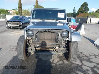 2018 Jeep Wrangler Unlimited Sport S with VIN 1C4HJWDG5JL839703, listed as a IAAI auction lot 42140205 with 61,604 mi miles and . Bid and sale history available at DreamBid. Image 13.